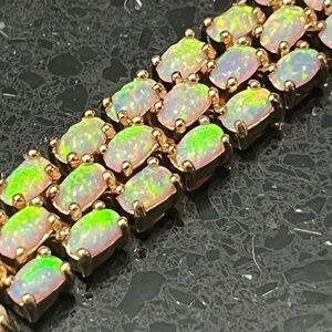Technibond vintage HSN aurora borealis opal tennis line statement bracelet gold